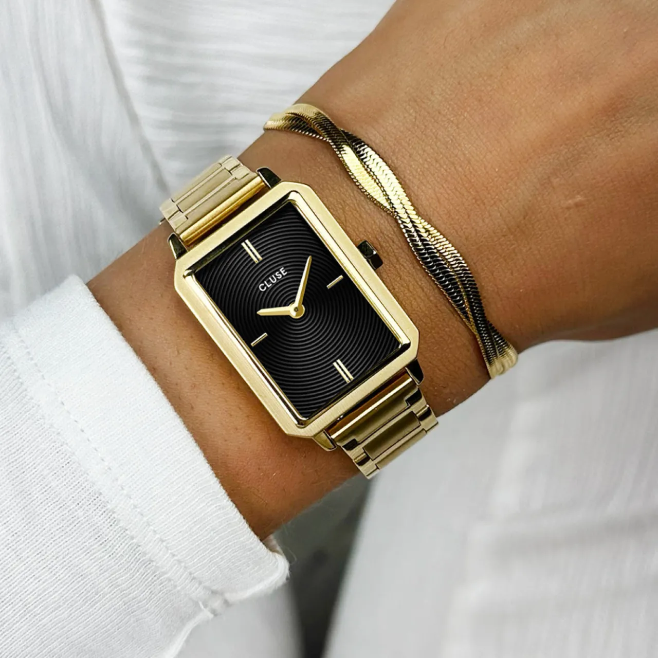 Femme CLUSE Fluette Watch Steel, Circular Texture Black, Gold Colour